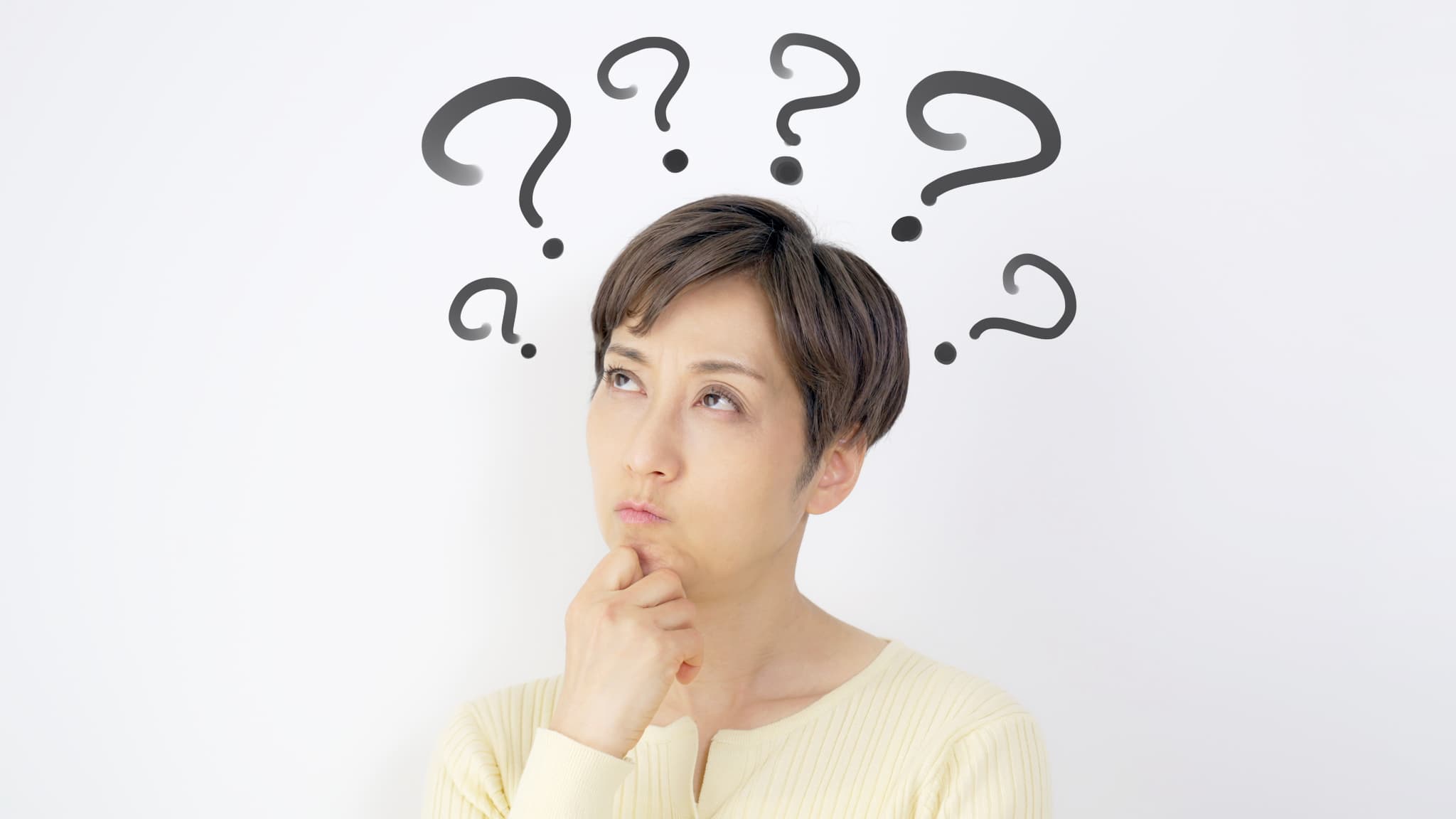 歯周病は治る病気なのか考える女性